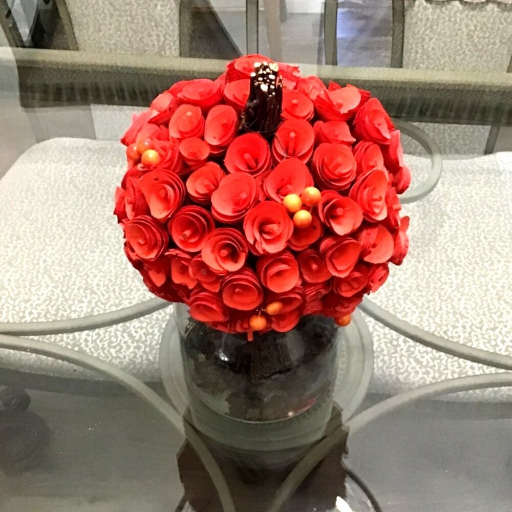 WOOD 8" ORANGE HARVEST ROSETTE PUNKIN WITH CLEAR VASE FILL WITH SMALL PINECONES